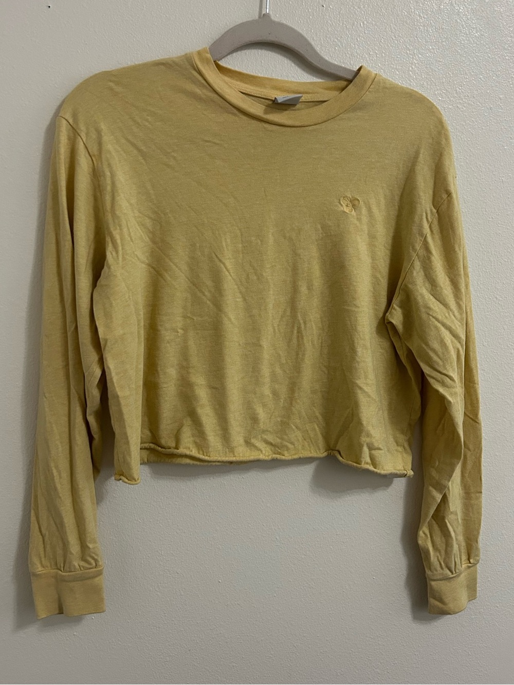TNA yellow long sleeve cropped rolled hem tshirt